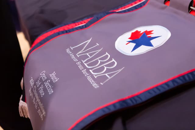 Embroidered NABBA banner reading Youth Open Section 3rd Place, 2026 Championships, with maple leaf and star logo