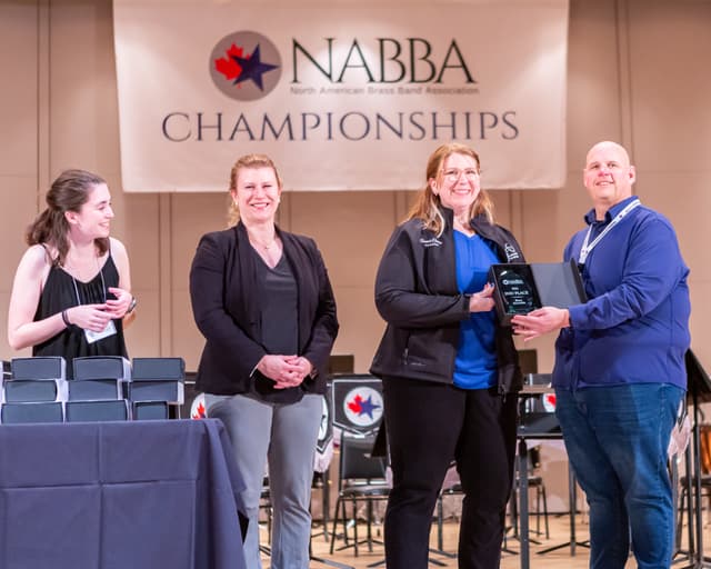 Plaque presented on stage at the NABBA Championships awards ceremony